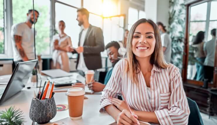 corporation team member smiling at the camera